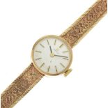 Tissot - Lady's 9ct gold cased cocktail watch having conforming bracelet