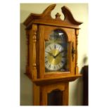Reproduction oak longcase clock, the arch shaped dial inscribed Emperor Clock Company Ltd, having