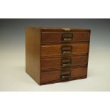 Early 20th Century table top filing chest of four drawers, 31.5cm wide