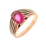 Gold coloured metal dress ring set large ruby coloured stone, the shank dated 1943, size V
