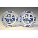 Pair of Chinese export blue and white porcelain plates, each decorated with two mothers with