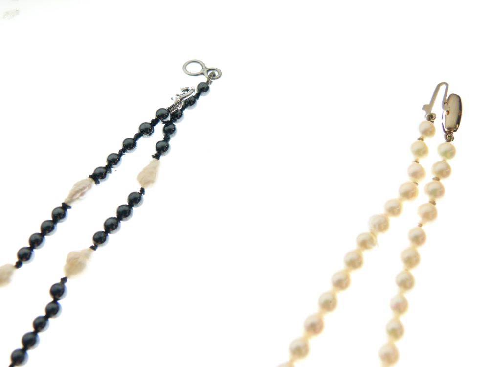 Cultured pearl necklace with yellow metal clasp stamped 9ct, 39cm long, together with a pearl and - Image 4 of 4