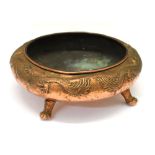 Oriental copper shallow bowl having relief decoration of dragon a pearl on four claw feet, 27cm wide