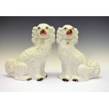 Pair of Staffordshire comforter spaniels, 32cm high