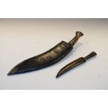 Eastern horn-handled kukri with leather sheath, together with a hardwood handled dagger (2)