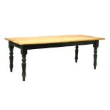 Pine refectory or farmhouse table with planked moulded top on painted base fitted one short frieze