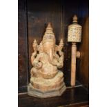 Carved wooden figure of Ganesh, 24cm high, and a prayer wheel