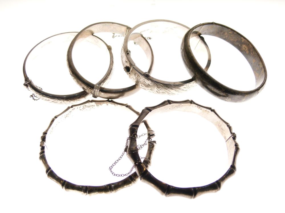 Six assorted silver and white metal snap bangles to include; two of simulated bamboo design, 3. - Image 2 of 6