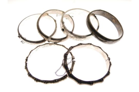 Six assorted silver and white metal snap bangles to include; two of simulated bamboo design, 3. - Image 2 of 6