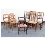 Group of 19th Century chairs to include; four rush seated spindle-backed ash and elm country chairs,