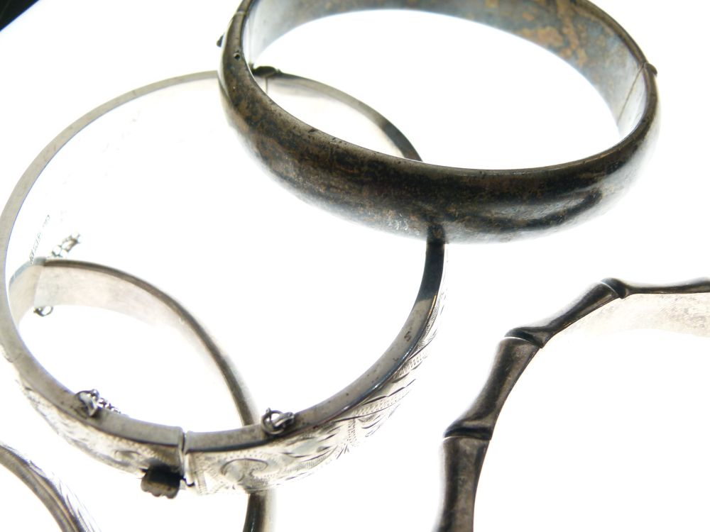 Six assorted silver and white metal snap bangles to include; two of simulated bamboo design, 3. - Image 6 of 6