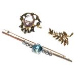 Three assorted gold and yellow metal brooches comprising: a 9ct gold pearl-set fern brooch, yellow