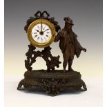 Early 20th Century bronzed spelter figural mantel clock with alarm, the white dial with Roman