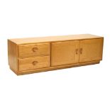 Ercol Golden Dawn Elm low cabinet fitted two drawers and pair of cupboards on castors, 155cm x