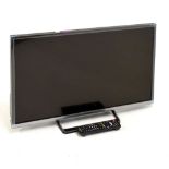 Panasonic 32-inch television with remote