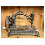 Wing & Co vintage C-frame sewing machine having hinged base, 27cm high