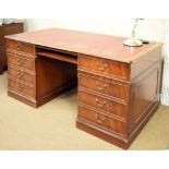 Reproduction mahogany twin pedestal desk having inset red writing surface, 159cm wide, together with