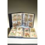 Postcards - two large albums containing a selection of garden, fruit and vegetable-themed postcards