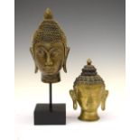 South East Asian brass Buddha, and a similar resin figure on a stand, 35cm high
