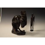 Ethnographica - African carved hardwood figure of a wood cutter, 40cm high, together with another