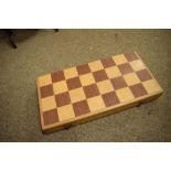 Wooden chess pieces in a folding chess board, 42cm wide, cased