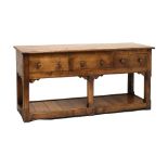 Good quality reproduction oak dresser fitted three drawers with pot board below, 183cm wide