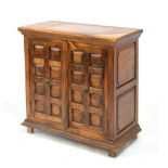 Colonial-style side cabinet with panelled doors, enclosing two shelves, 82.5cm x 45cm x 87cm high