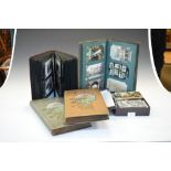 Postcards - Good selection to four albums plus box to include; a few ethnographic examples, UK and