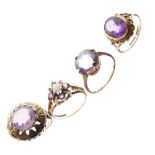 Three 9ct gold dress rings, each set amethyst-coloured stone, 10.g gross approx, together with an