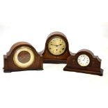 Early 20th Century inlaid beech or mahogany mantel clock, 29cm wide, together with another of