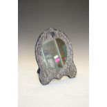 Elizabeth II silver-framed easel dressing mirror with heart-shaped mirror plate, 27cm high