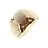 Yellow metal and opal dress ring set oval cabochon, the shank stamped 18k, size L, 6g gross approx