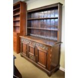 Late 19th/early 20th Century carved oak dresser with plate rack, 152cm wide