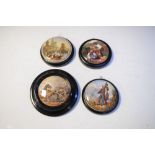 Four Victorian Prattware pot lids comprising: 'Garibaldi', 'War', 'Strasburg' and 'Feeding the