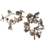 Two white metal charm bracelets with an assortment of silver and white metal charms, 4.6toz approx