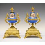 Pair of Continental gold painted metal and ceramic urns, 24cm high