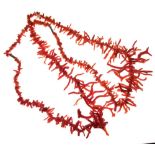 Two coral necklaces of graduated fringed design, 97g gross approx (2)