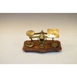 Set of brass and fruitwood postal letter scales with weights