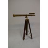 Reproduction brass telescope having a mahogany tripod