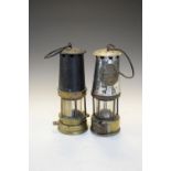 Two early 20th Century brass lanterns, one with plaque The Protector Lamp & Lighting Co Ltd, Eccles,