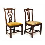 Two 19th Century mahogany Chippendale style dining chairs having drop-in seats