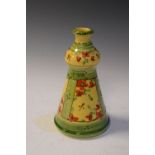 Vallauris French olive oil bottle having floral decoration on a green and yellow ground, 20cm high