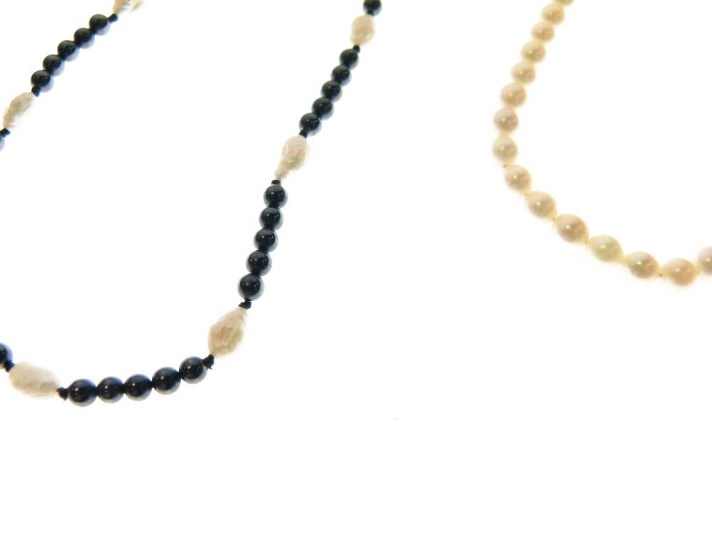 Cultured pearl necklace with yellow metal clasp stamped 9ct, 39cm long, together with a pearl and - Image 3 of 4