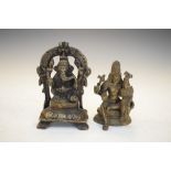 Indian bronze model of Ganesh seated beneath arch, 12cm high, together with a smaller deity (2)