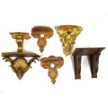 Various carved gilt wood and other wall brackets, and a Toby jug