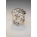 Late Victorian silver cylindrical pot and cover with repoussé decoration, London 1899, 5.5cm high,