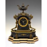 Late 19th Century French black slate mantel clock, the black dial with gilt Roman numerals, the