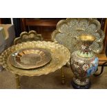 Three circular brass Indian trays, one other with feet attached, and a cloisonné vase with pedestal
