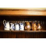 Collection of relief moulded lustre jugs