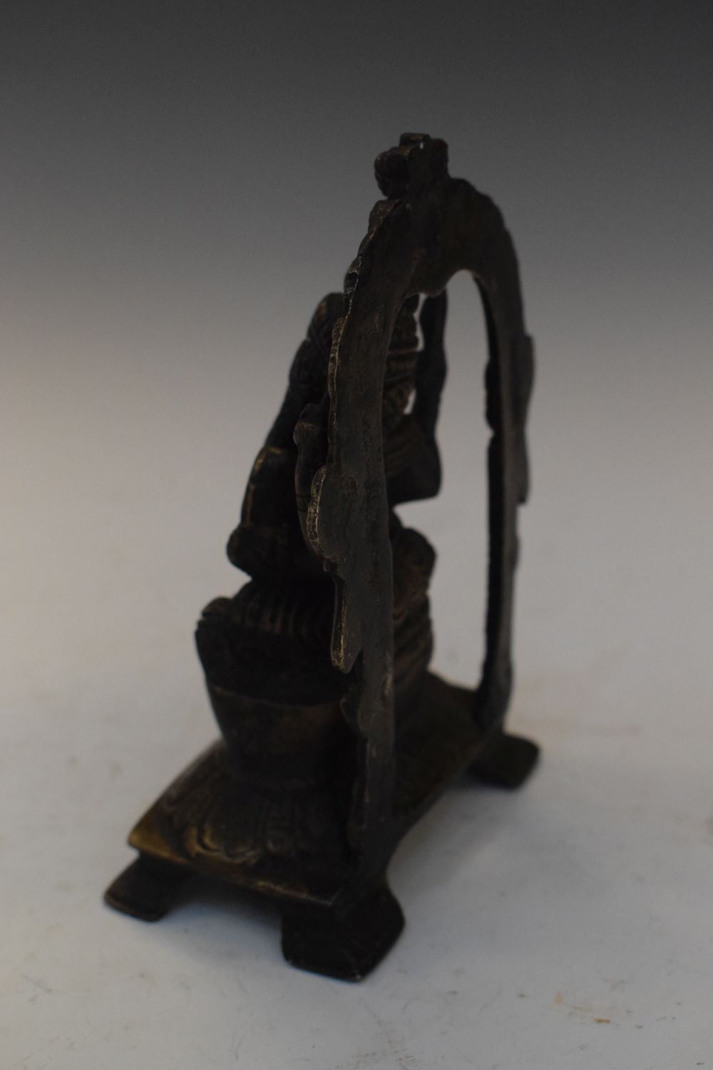 Indian bronze model of Ganesh seated beneath arch, 12cm high, together with a smaller deity (2) - Image 3 of 8